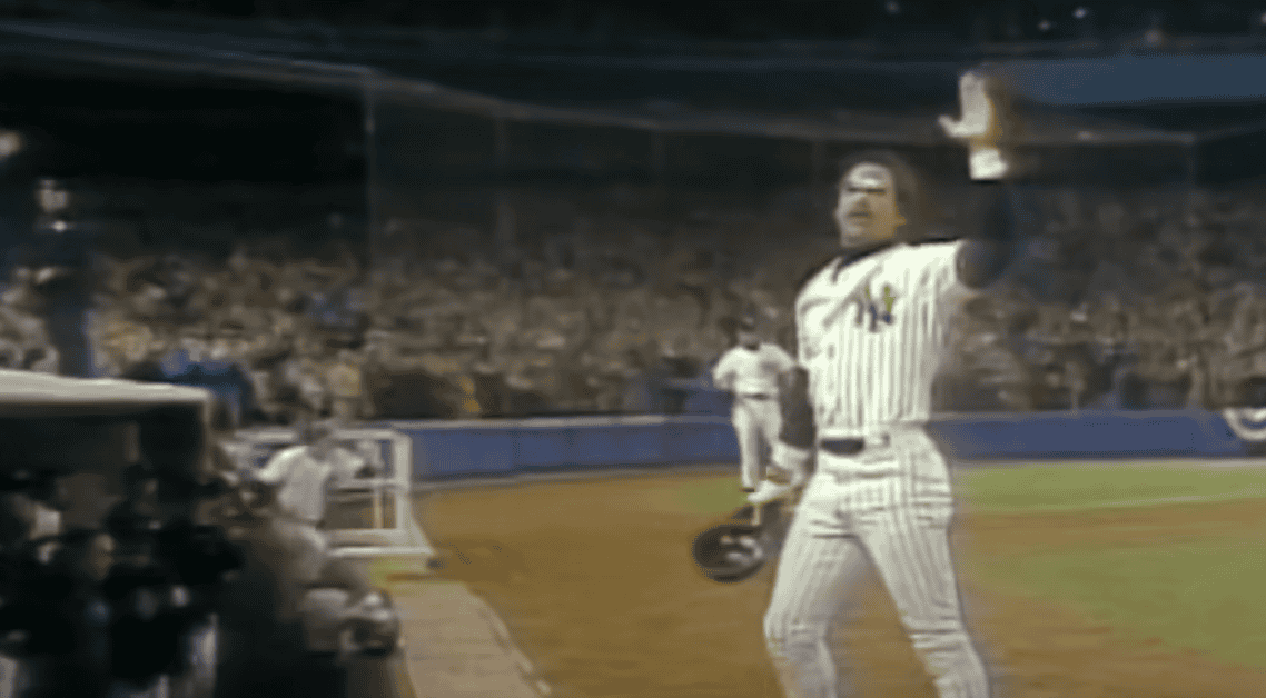 Reggie Jackson celebrates a key home run, embodying clutch performance in MLB.